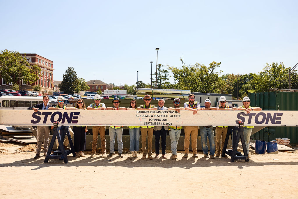 Stone Building Company Celebrates Two Major Project Milestones in Auburn